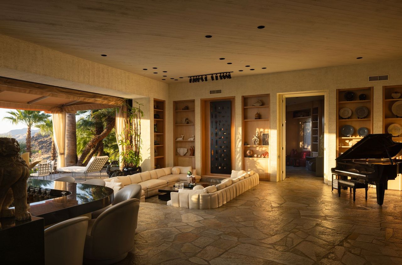 Main residence great room with piano and open-air terrace